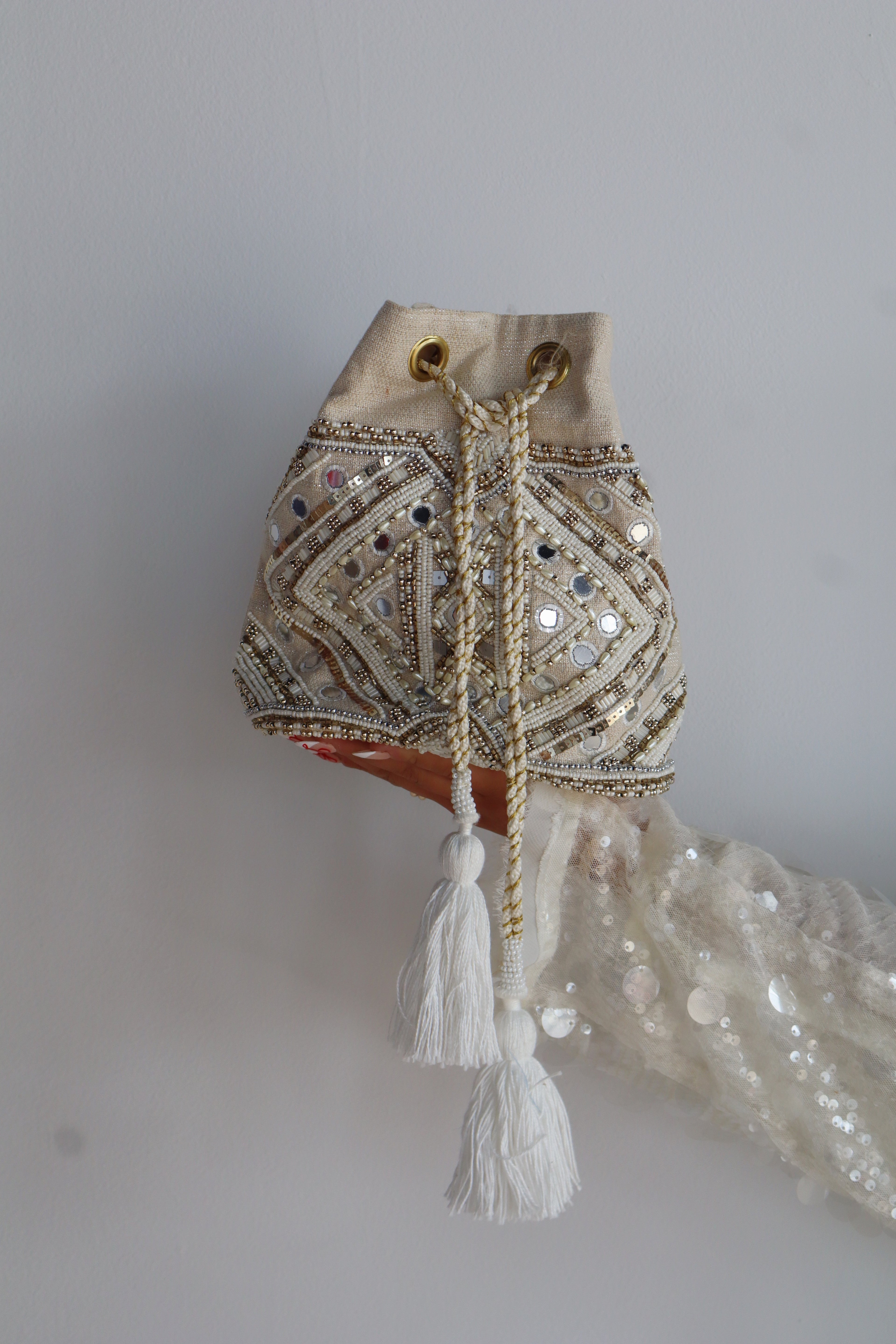 THE FRANCIS BUCKET BAG - IVORY